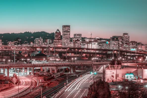 A vibrant cityscape timelapse showing Paris at dusk with moving traffic and glowing lights.