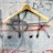 Close-up of trendy urban accessories displayed on a concrete wall
