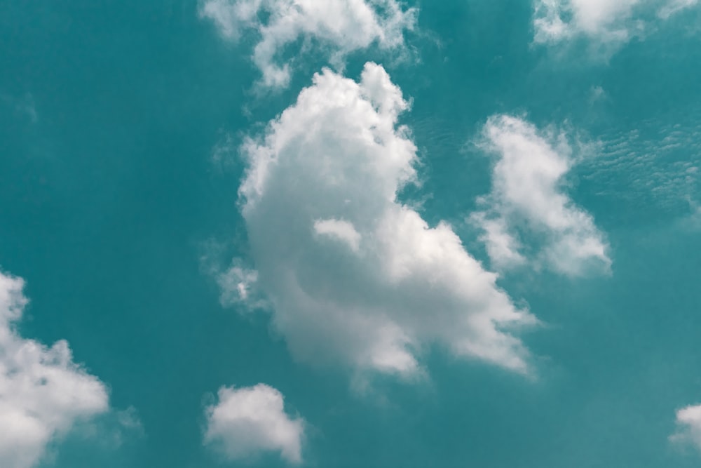 white clouds with blue sky