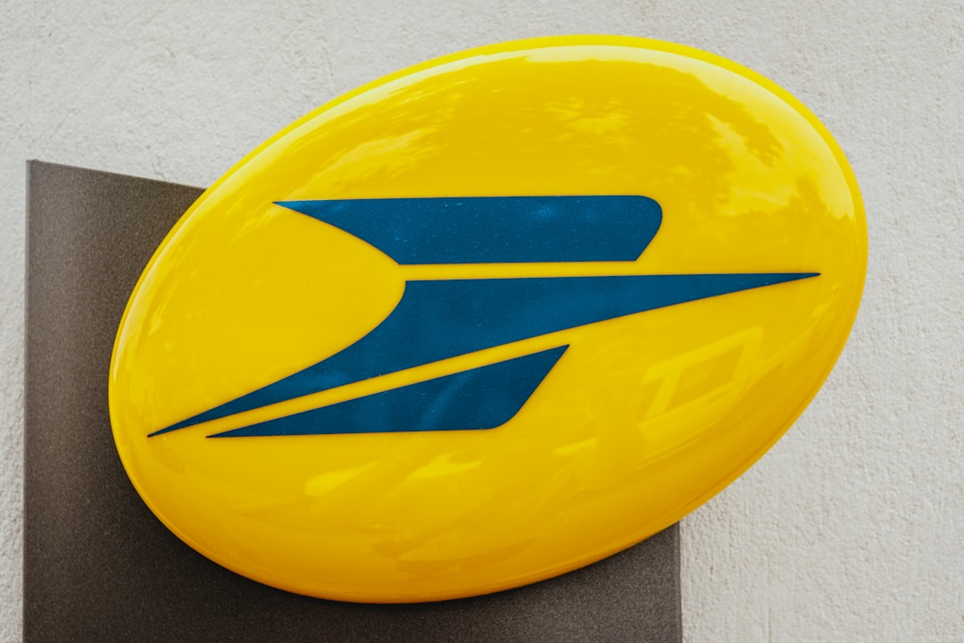 oval yellow and blue emblem