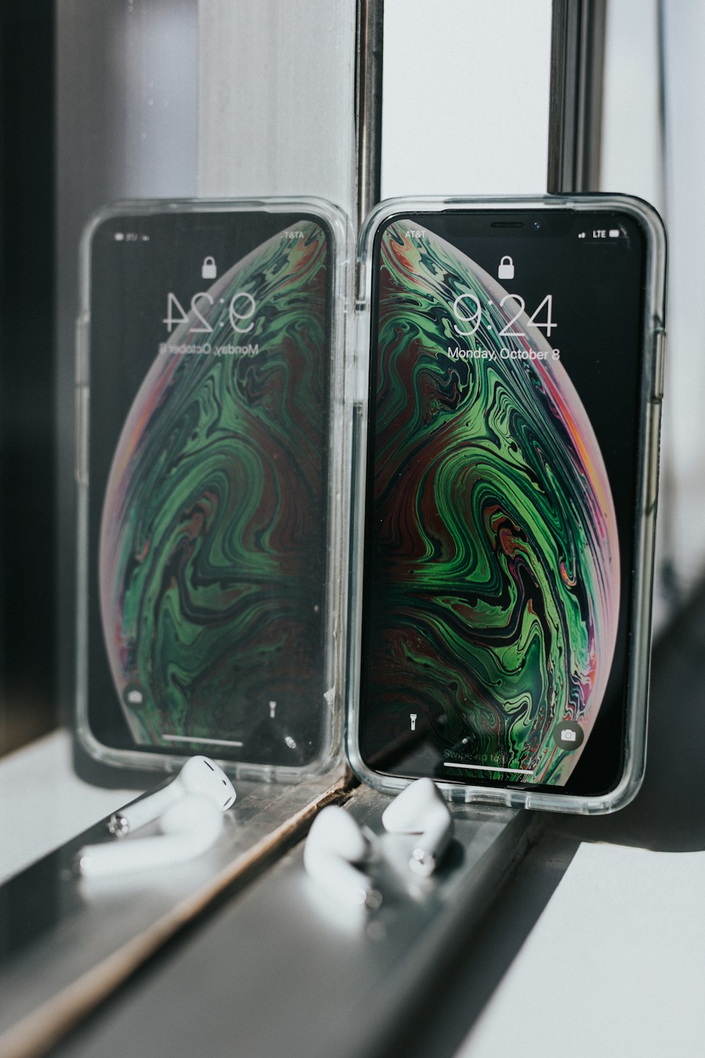 two space gray iPhone Xs MAx's