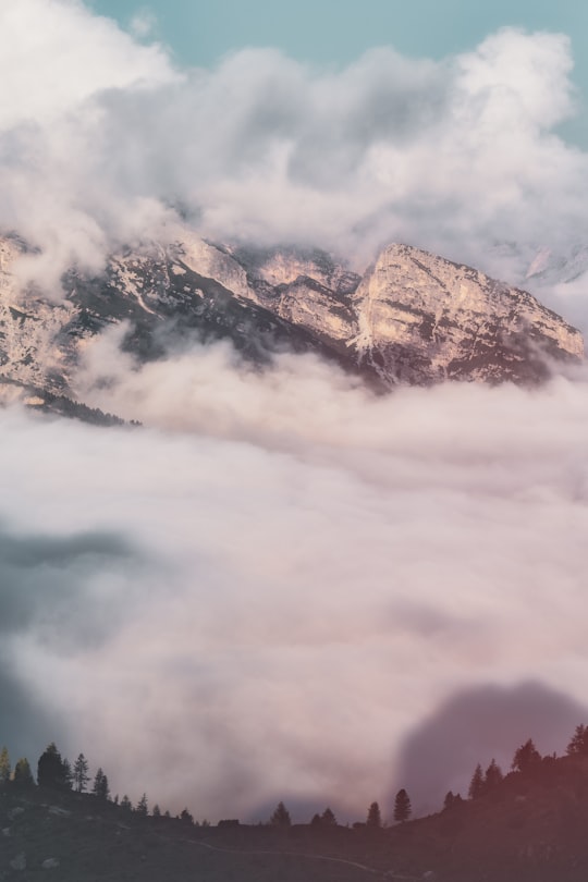 mountain covered with fog in Lake Misurina Italy