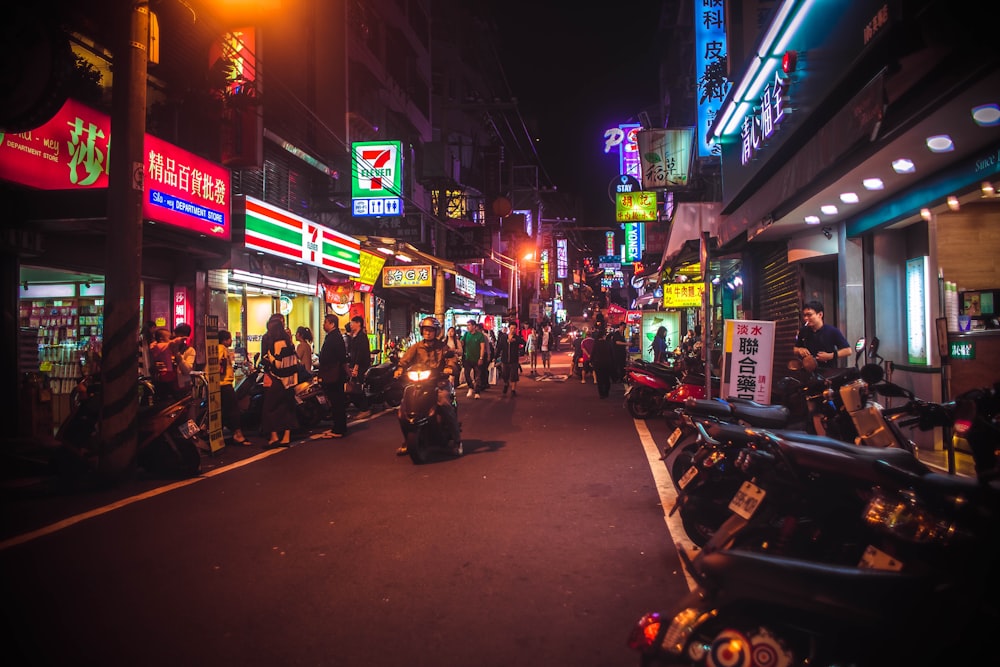 people on road at night