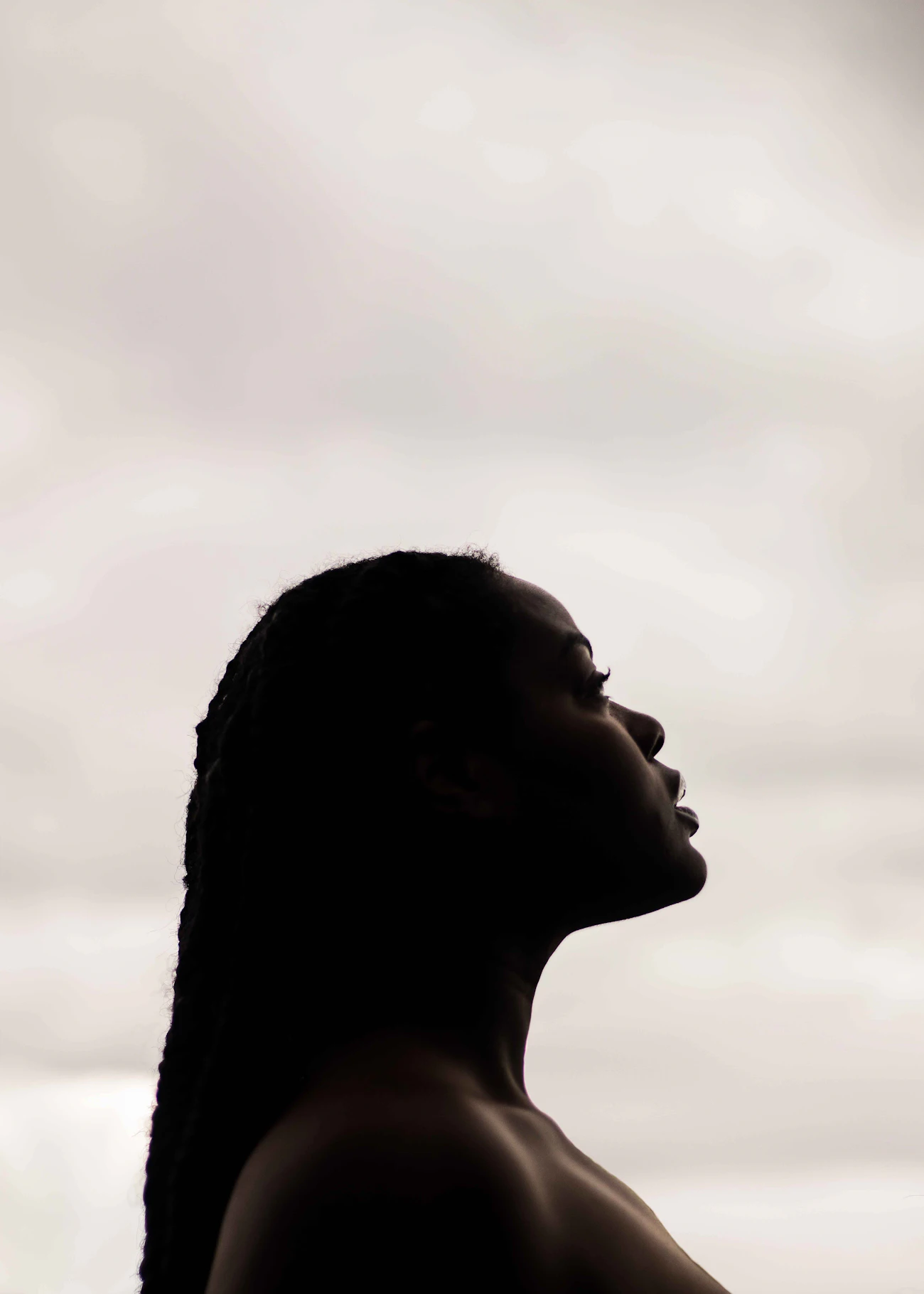 Close-up of a woman's lower face and cheek in a calm, neutral expression, illustrating smooth, settled skin quality relevant to skin boosters and biostimulators