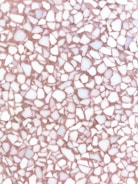 A detailed terrazzo pattern composed of irregular white and light pink stone fragments on a pinkish-brown substrate. The stones are of various shapes and sizes, creating a random, mosaic-like effect.