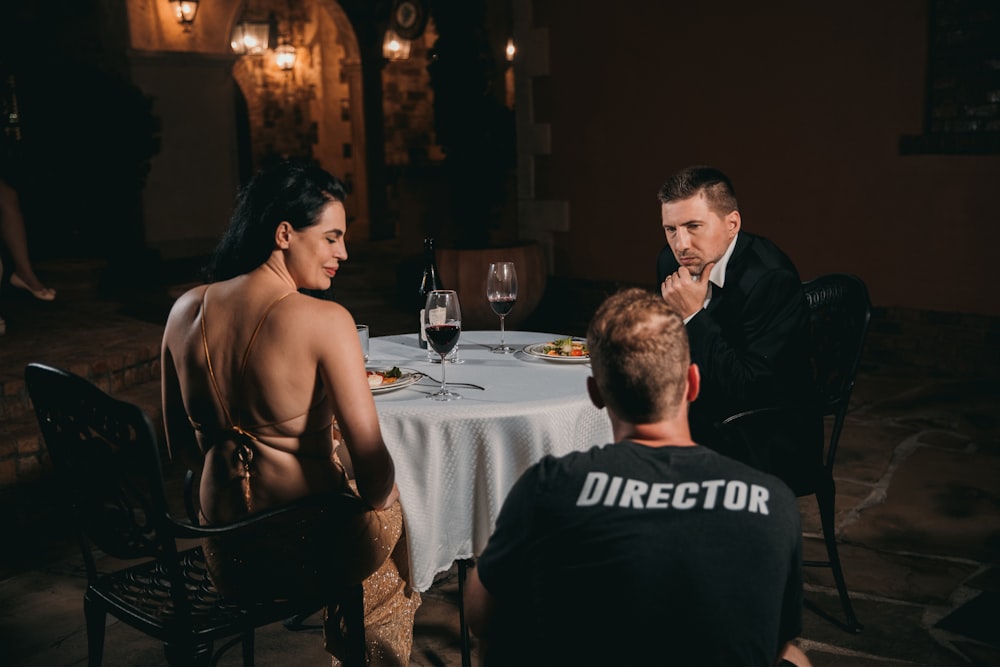 a man and a woman sitting at a table