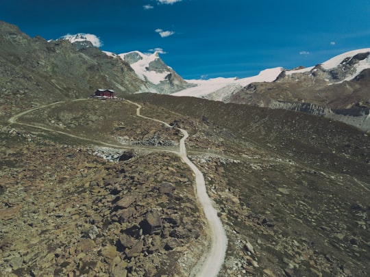 aerial photo of road on rock mountain during daytime in Zermatt Switzerland