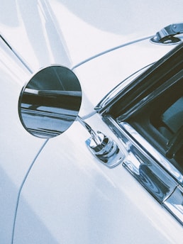 Before and after shots showing a car’s damaged side restored to perfect condition.