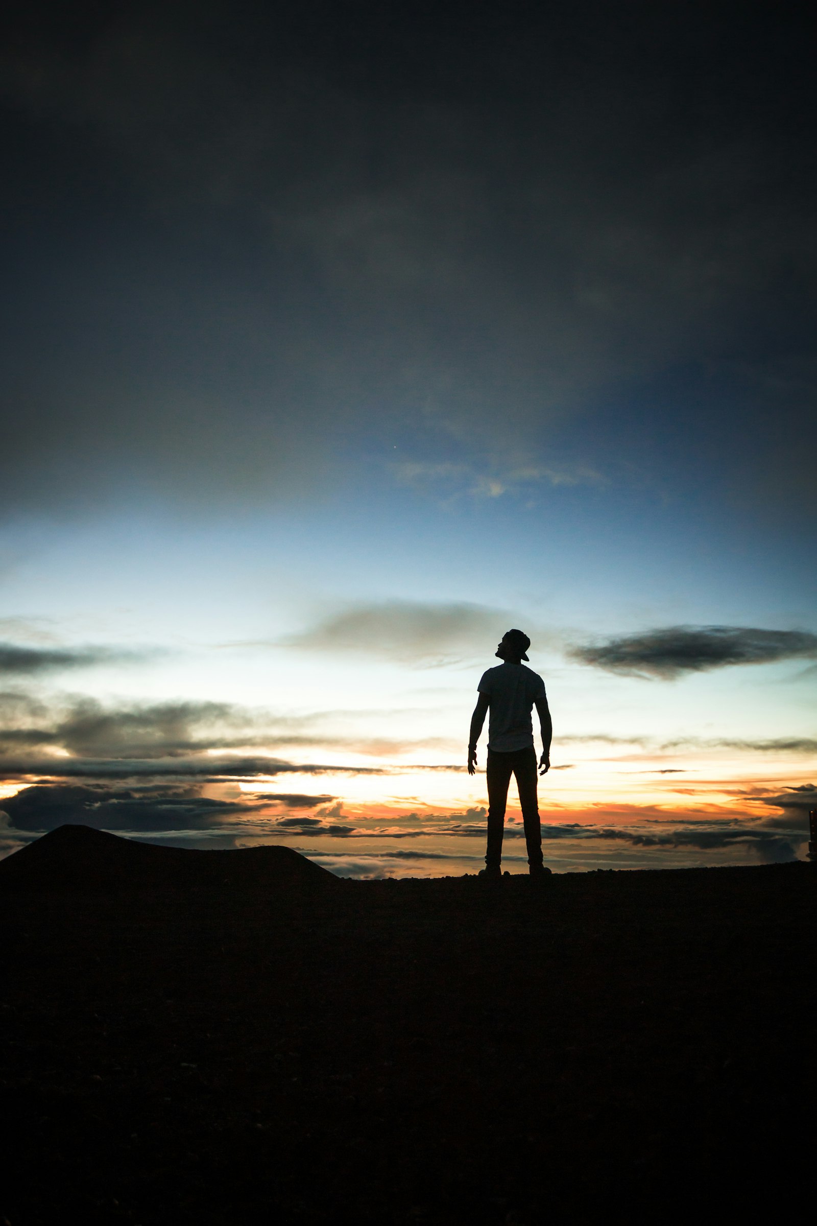 Canon EOS 70D + Canon EF 17-40mm F4L USM sample photo. Silhouette of man during photography