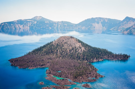 island during daytime in Crater Lake National Park United States
