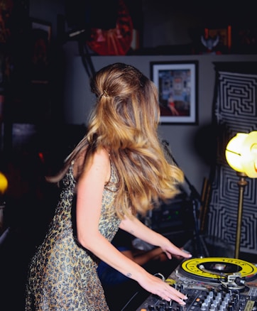 woman playing mixer at night