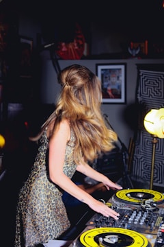 woman playing mixer at night