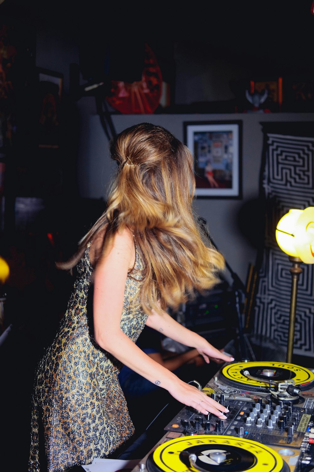 woman playing mixer at night