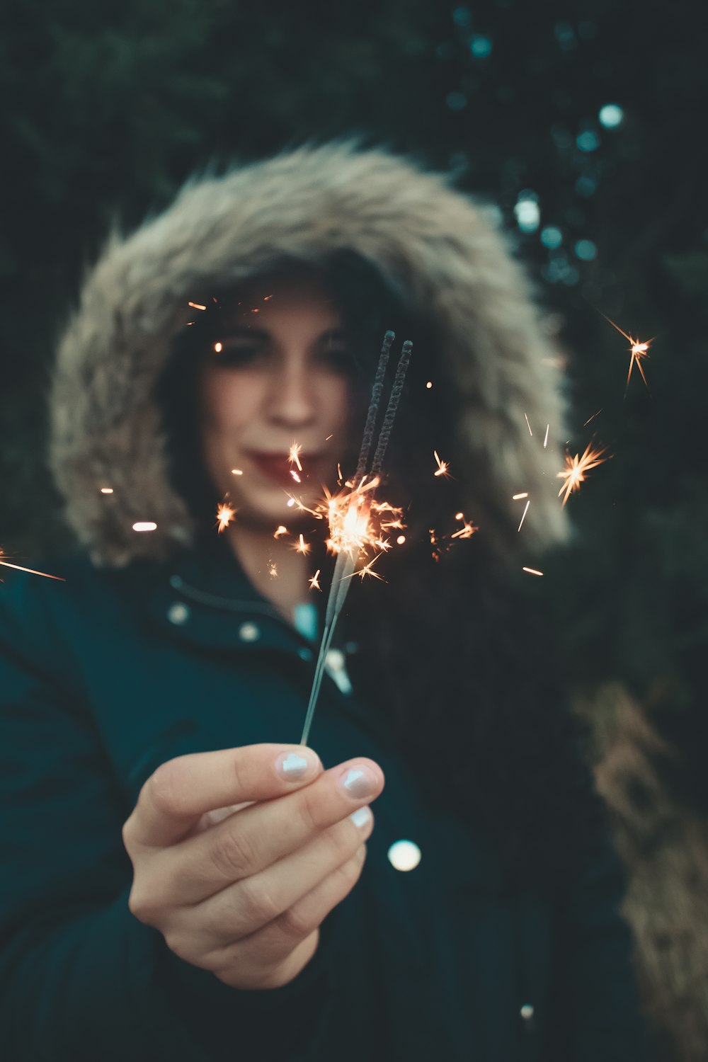 woman holding sparkler