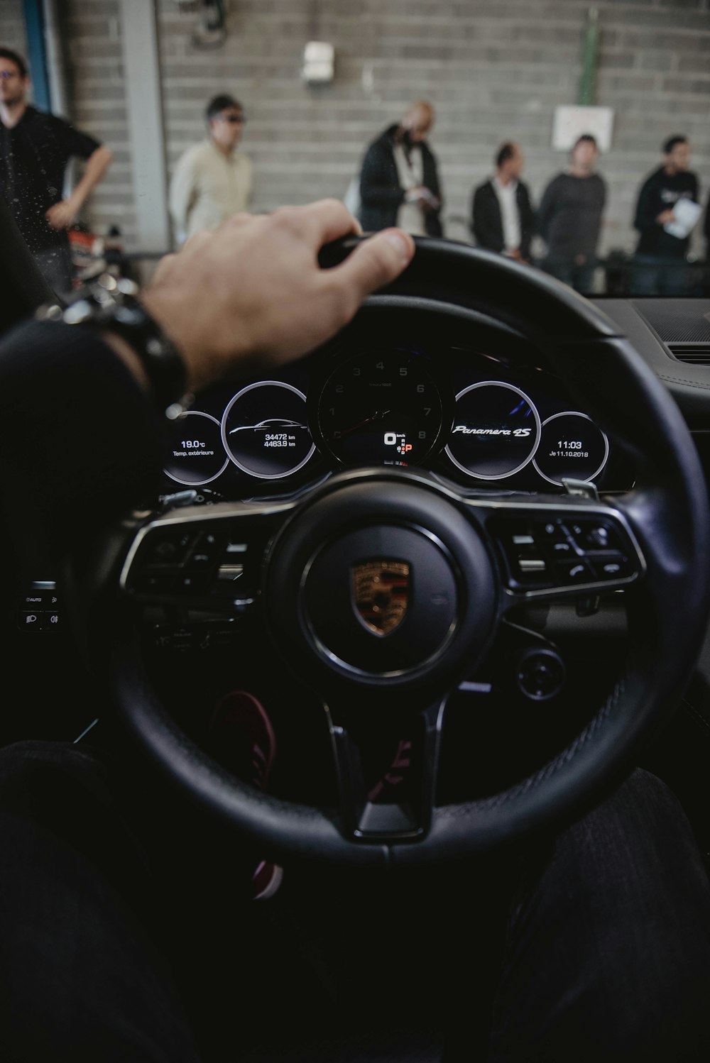 black Porsche steering wheel