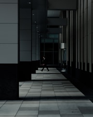 man standing in hallways