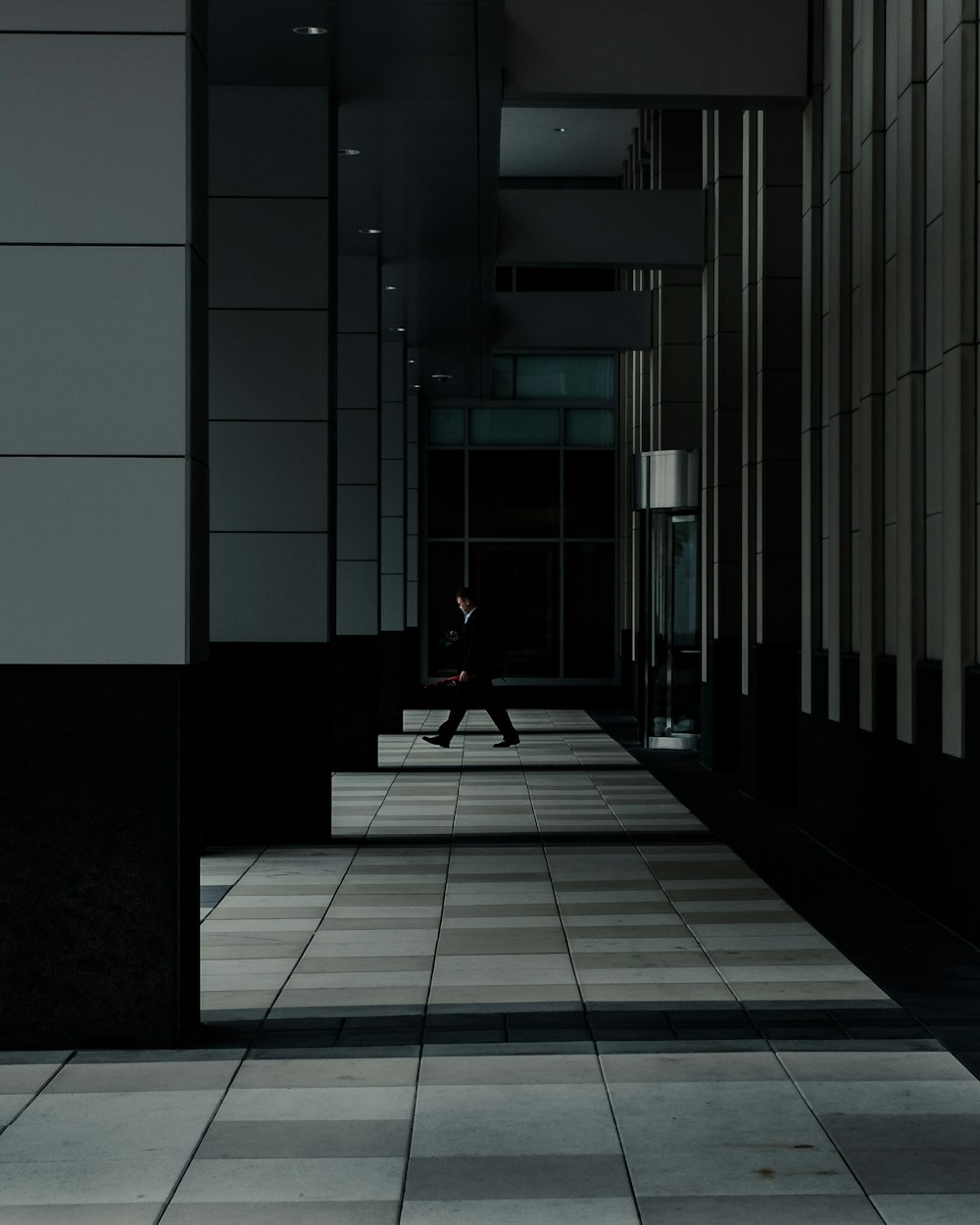 man standing in hallways