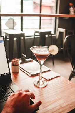 clear martini glass with beverage