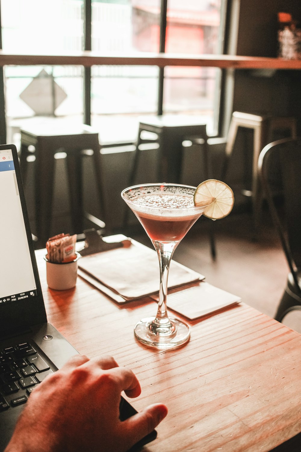 clear martini glass with beverage