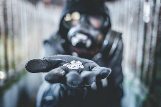 person showing glass shard in St. John's Canada