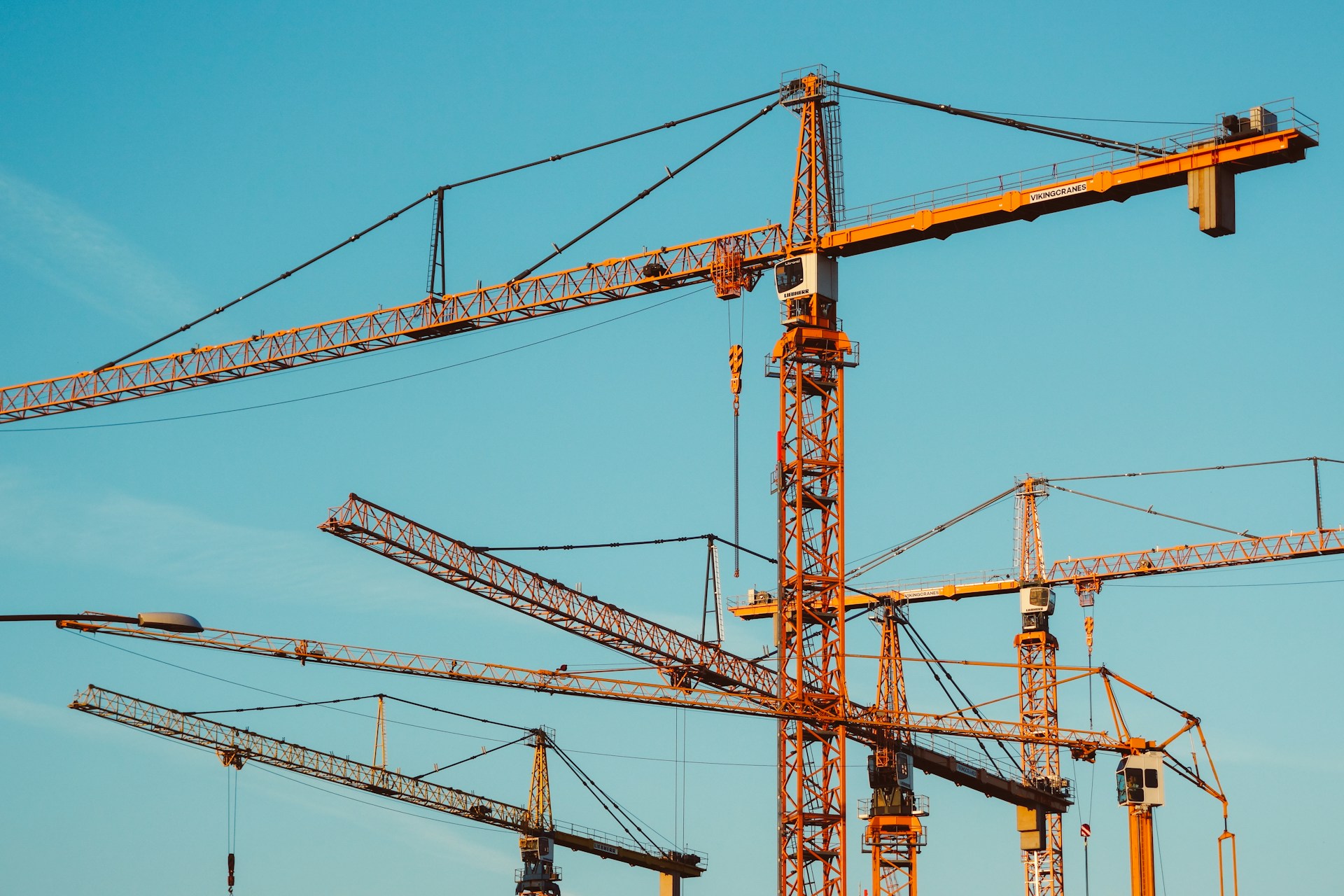 brown tower cranes