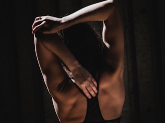 woman wearing black sports bra