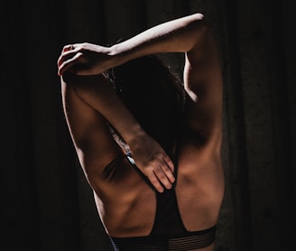 woman wearing black sports bra