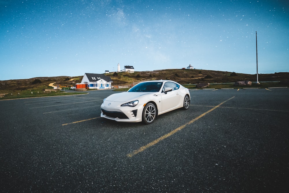 white vehicle on road