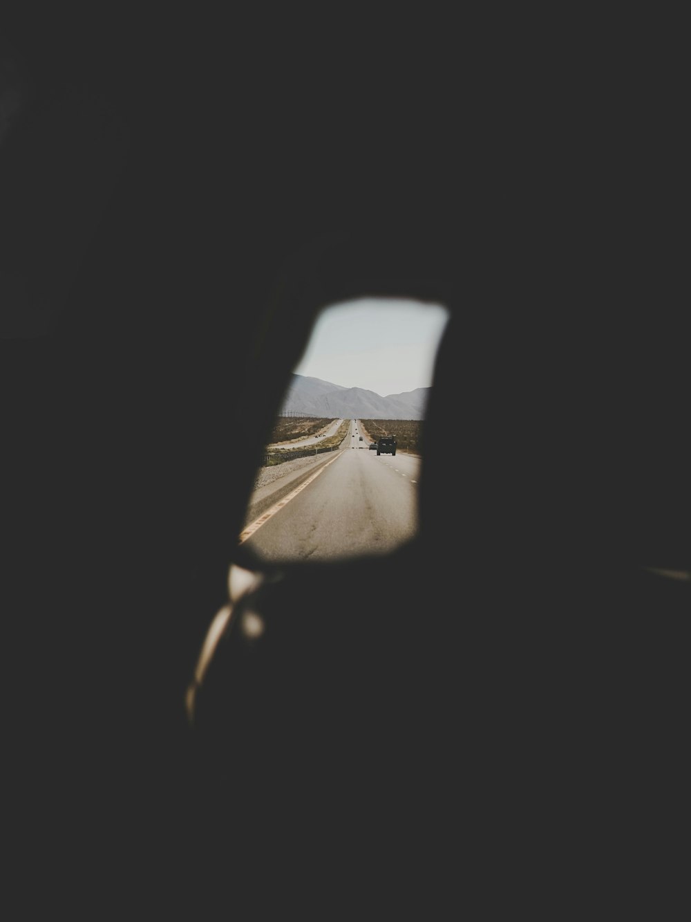 a view of a highway from inside a vehicle