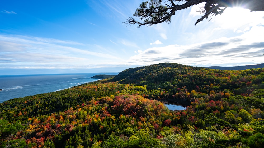 bird's eye view photography of mountains under blue sky