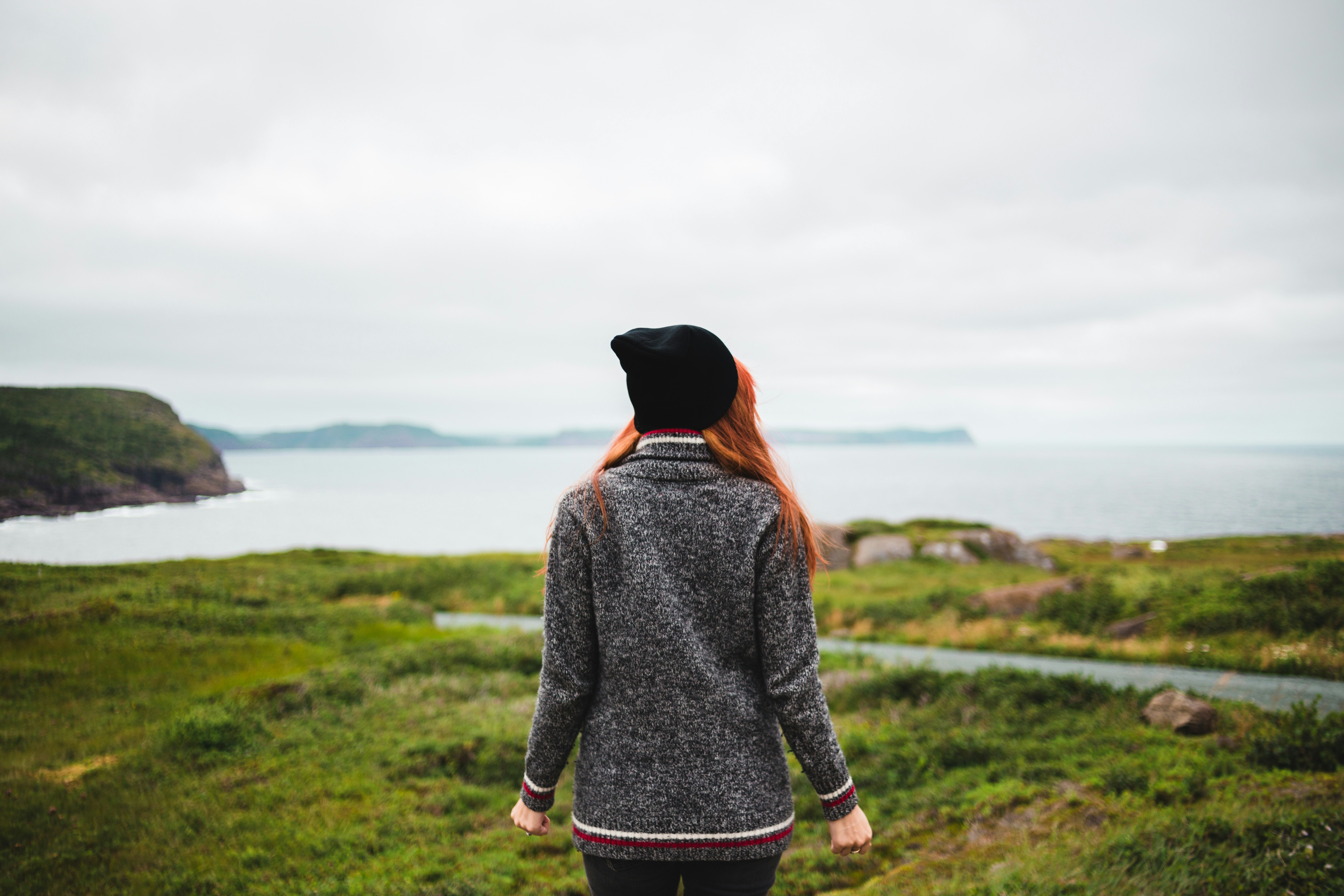 woman standing near lake
