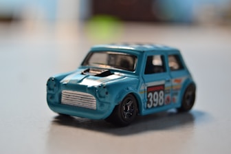 A close-up of a car's auction bid card on a table.