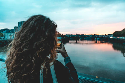 woman holding smartphone