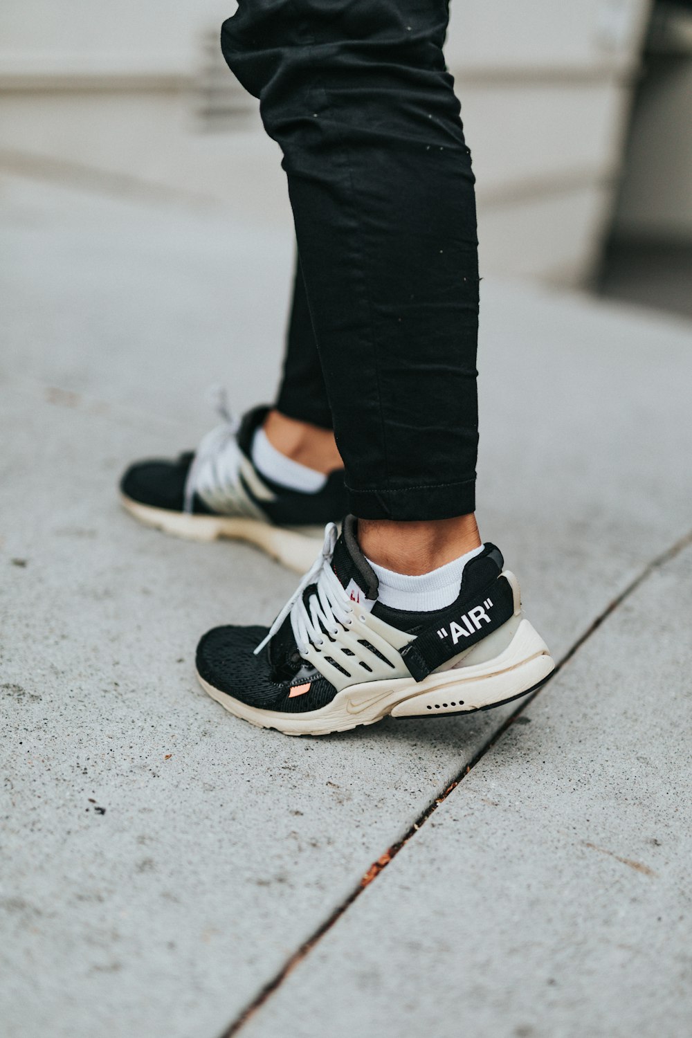 pair of black and white running shoes