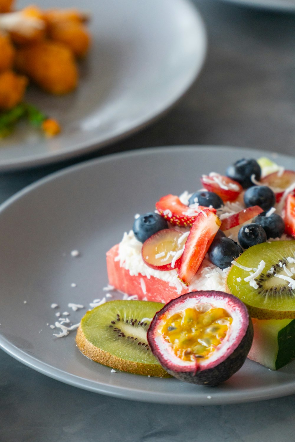 shallow focus photo of fruit salad on saucer