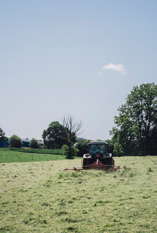 black tractor under blue sky in Vielsalm Belgium