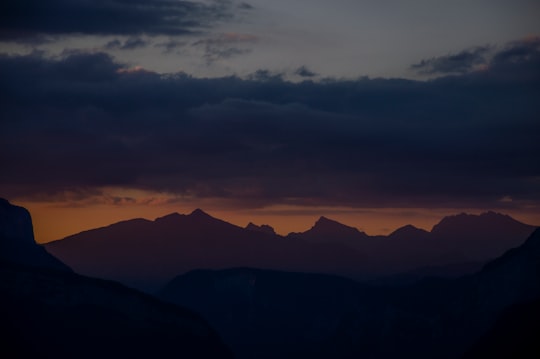 silhouette photography of mountain during golden hour in Combloux France