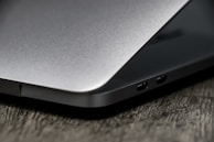 A close-up of a sleek laptop showcasing product details.