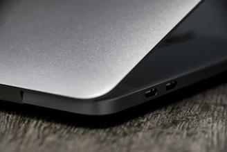 A close-up of a sleek laptop showcasing product details.