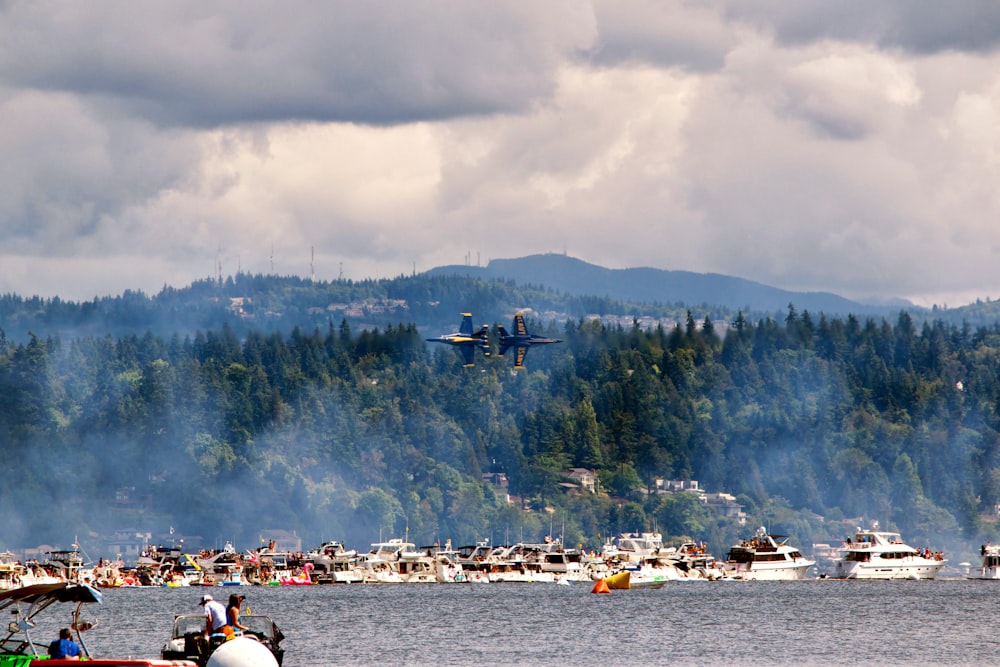 white power boat on body of water