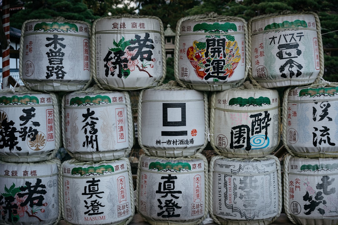 pile of white-and-green containers