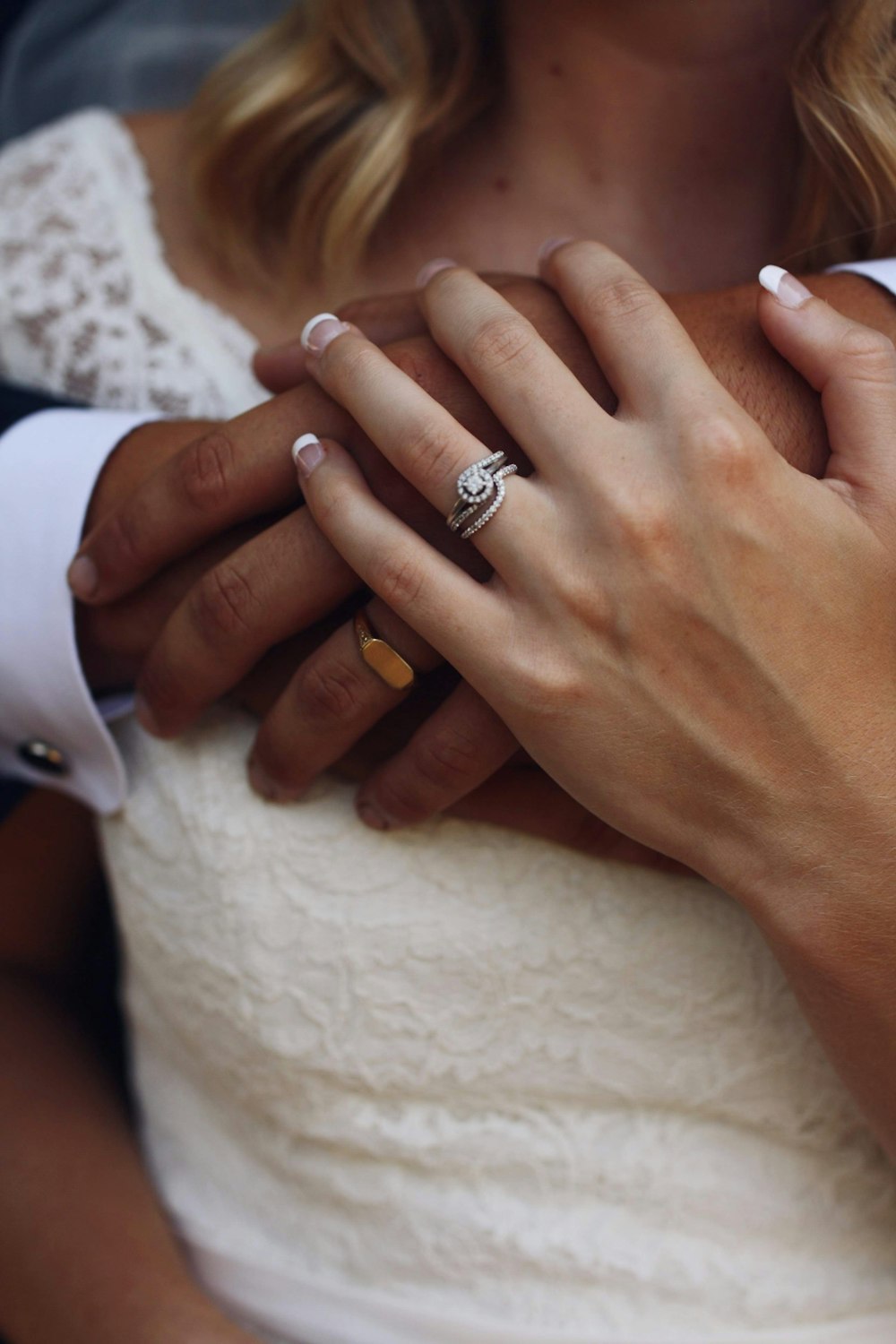 woman wears silver-colored ring