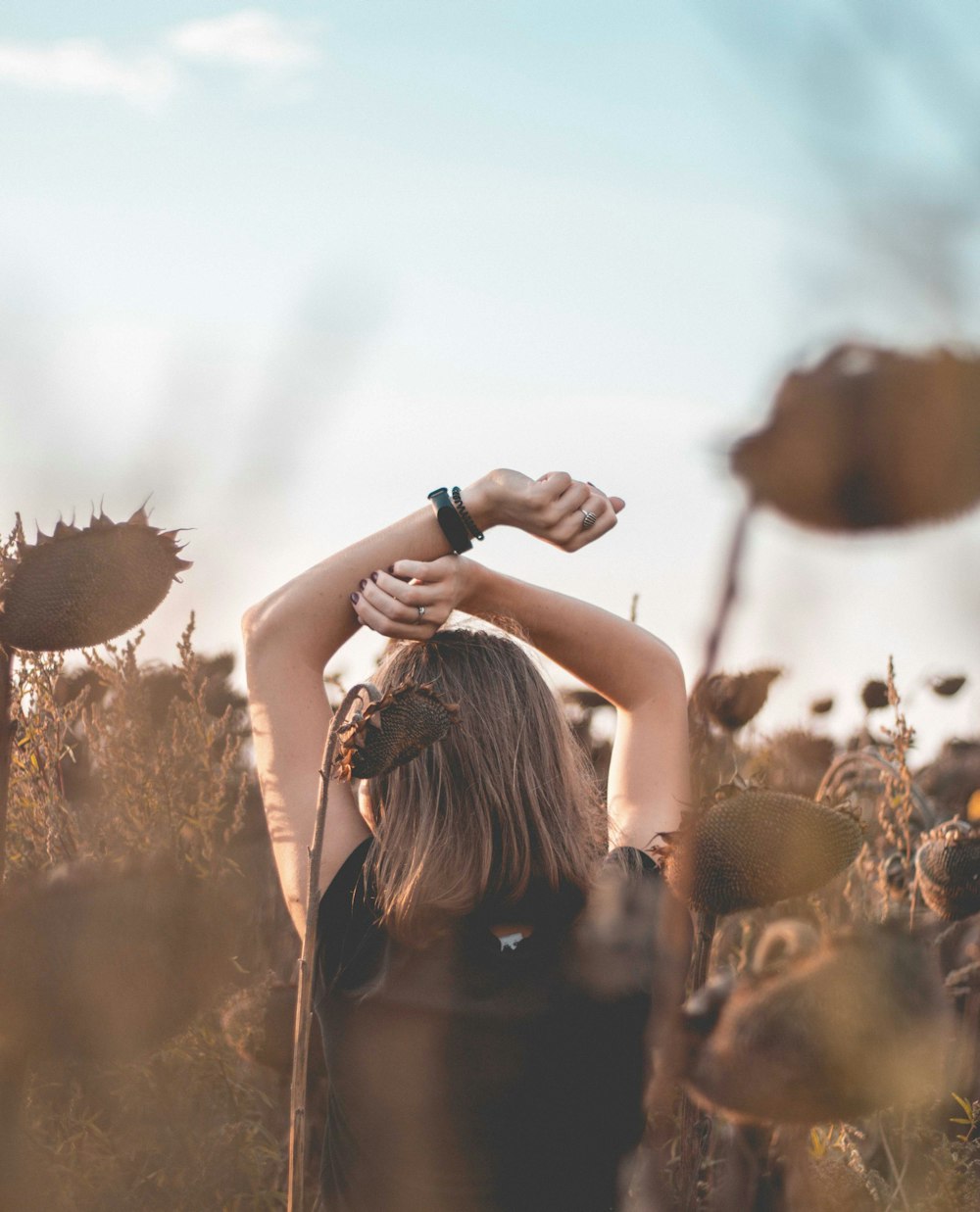 woman surrounded by plants