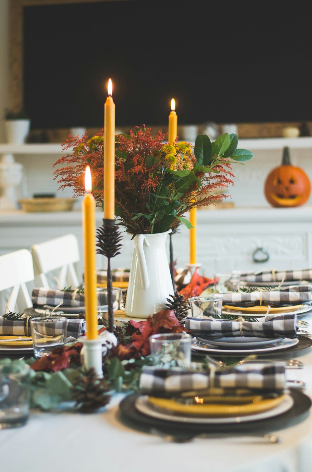 shallow focus photo of yellow lighted candles