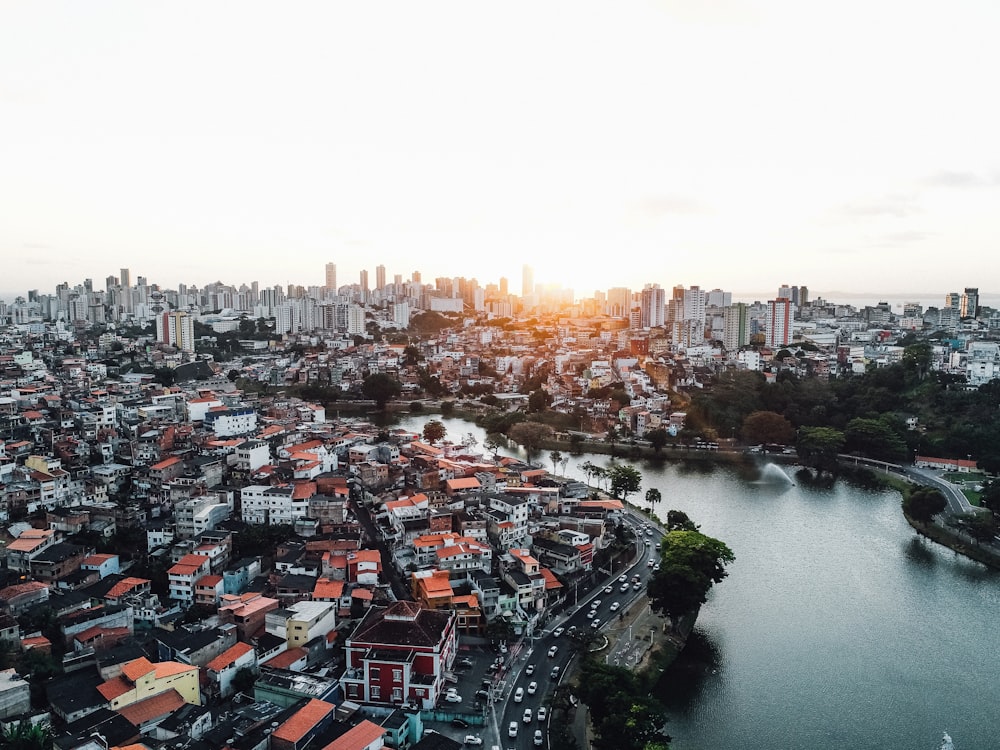 an aerial view of a city with a river running through it