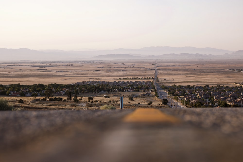 a view of a road in the middle of a desert