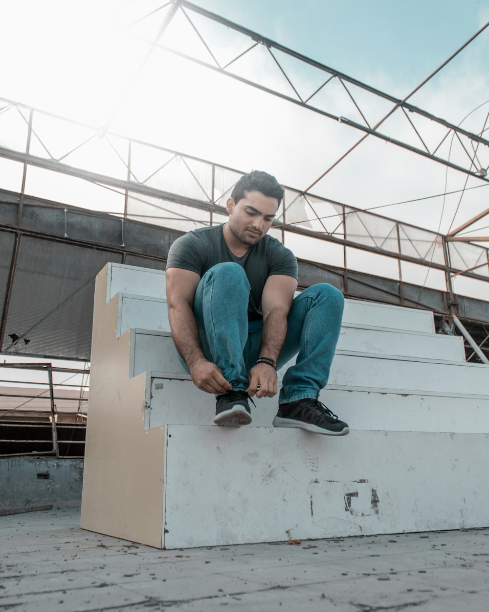 man sitting on stairs