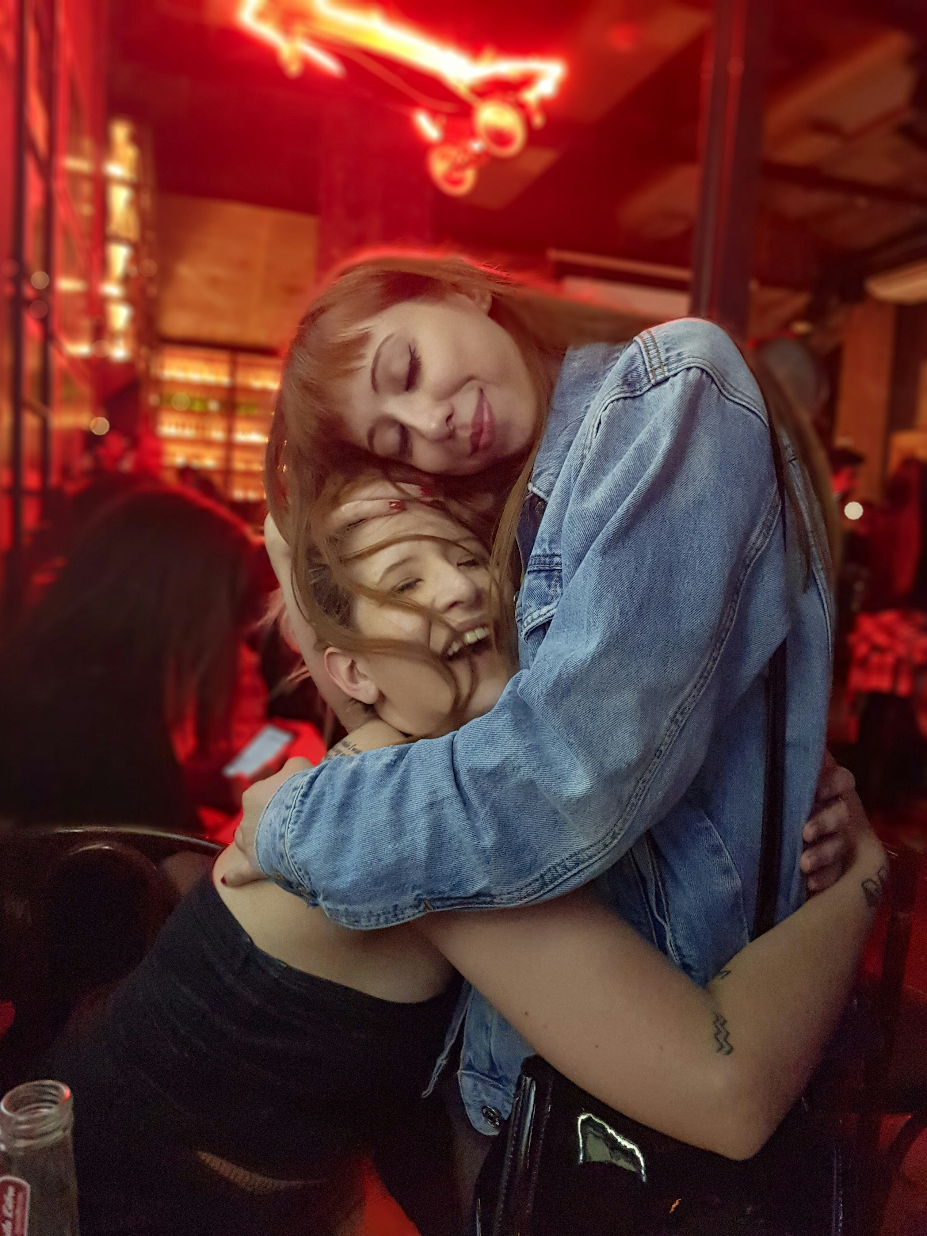 Lovely girls In a very care moment, In an Bar at São Paulo, Brazil.