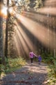 woman walking in forest with child to promote upcoming virtual nutrition education group