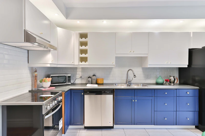 Kitchen with painted blue cabinets